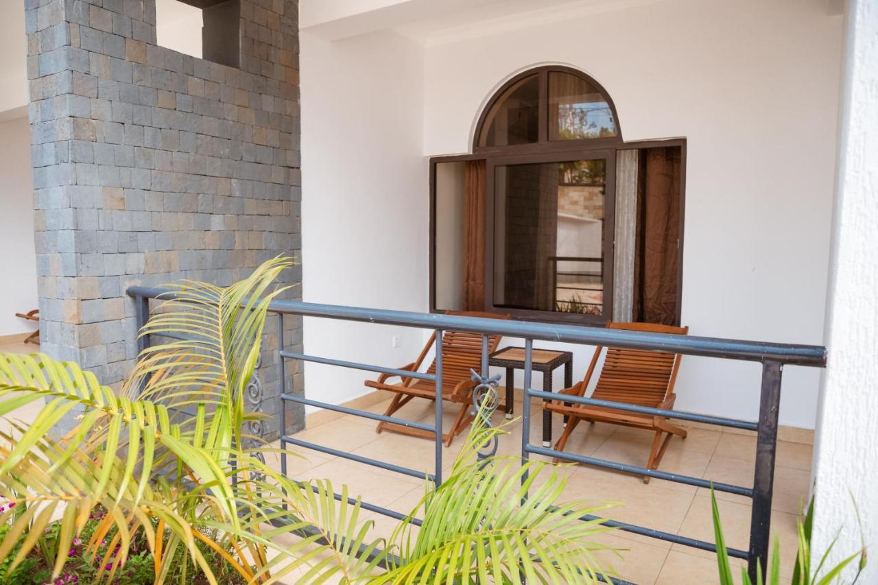 Ndaru Luxury Suites Кигали Экстерьер фото